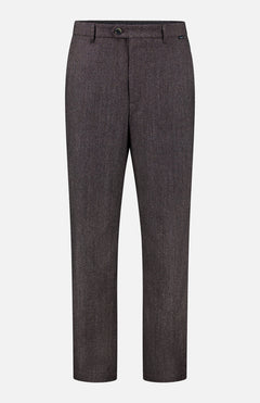 The CLOSED Fairport Relaxed Trouser Pant in a brown wool blend showcases a classic herringbone pattern, designed with a high waist and straight-leg cut. These dress pants feature a front fly with button closure, belt loops, and side pockets, and are displayed against a white background.