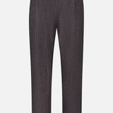 Back view of the CLOSED Fairport Relaxed Trouser Pant in dark gray wool-blend, featuring a high waist, straight leg, belt loops, two buttoned back pockets, and a subtle textured pattern, displayed on a plain white background.