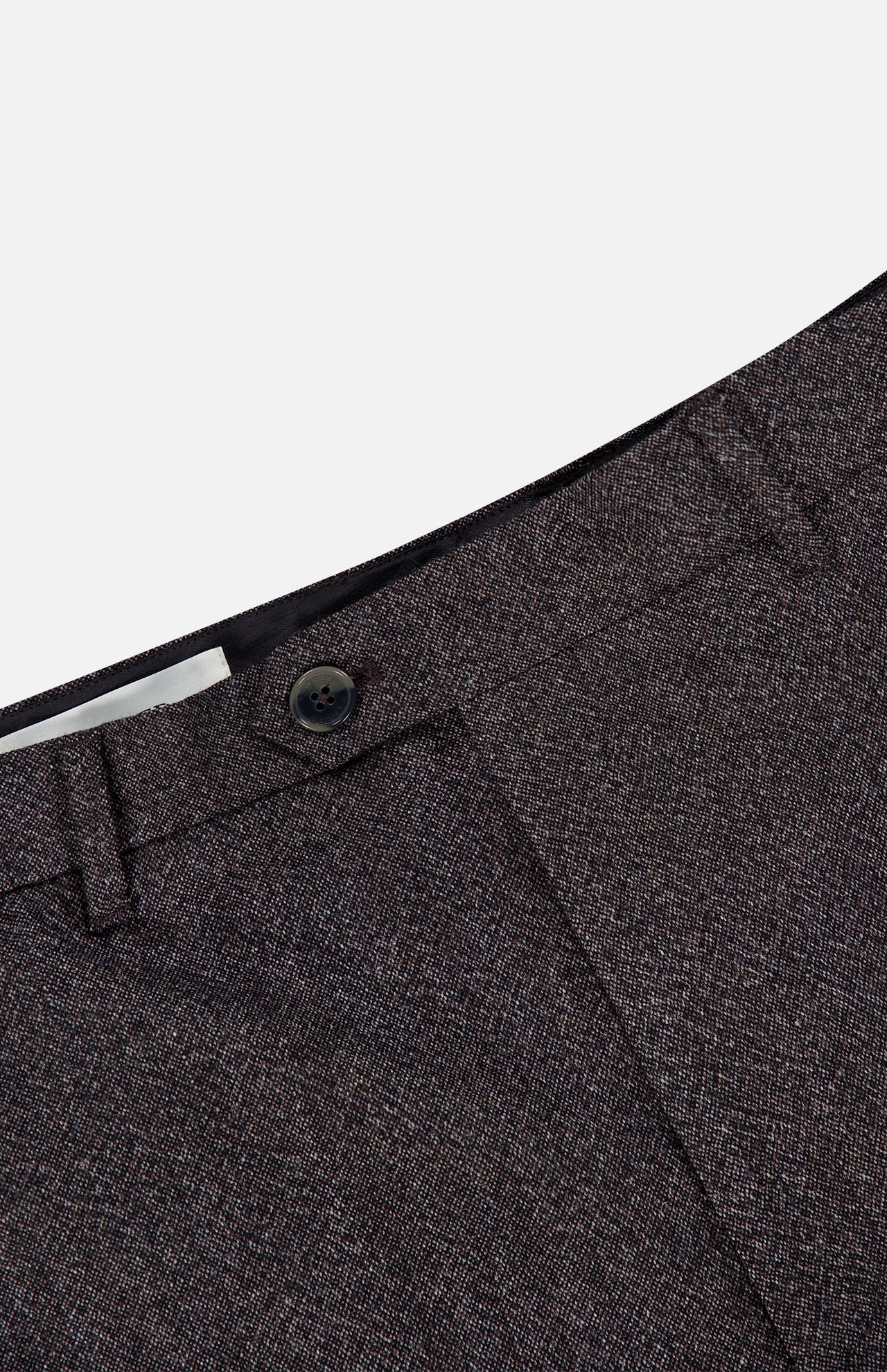 Close-up of the waistband and button of the Fairport Relaxed Trouser Pant by CLOSED in dark brown, showcasing the textured wool-blend fabric and part of the zipper fly. These high waist, straight leg pants emphasize meticulous tailoring and refined style.