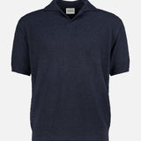 The CLOSED French Terry Johnny Collar Polo Shirt features soft, textured navy blue fabric, short sleeves, and a stylish V-neck Johnny collar, shown against a plain white background.