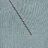 Close-up of the Half Zip Jumper Sweater by CLOSED, shown in pale blue ribbed knit cotton-blend fabric with a silver half zipper partially unzipped to showcase the texture and refined details of this pullover.