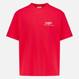 A vibrant red cotton short-sleeve t-shirt by CLOSED, featuring a small white fish graphic and "CLOTHES for humans" text on the left chest, shown against a plain white background.