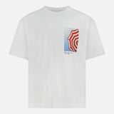 The CLOSED Printed Graphic T-Shirt, made from organic cotton, features a small chest photo print of a red-and-white striped umbrella beneath a blue sky.
