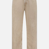 The Shoreham Wide Pant by CLOSED is crafted from beige denim in a wide, straight-leg silhouette, featuring a button and zipper closure, front and back pockets, and visible seam detailing. Made in Italy, it is displayed against a plain white background.