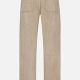 Back view of the CLOSED Shoreham Wide Pant in beige denim, showcasing a wide fit with two rear pockets, belt loops, and visible stitching. The fabric has a slightly faded look and features a black patch on the back waistband.