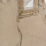 The Shoreham Wide Pant by CLOSED are beige denim jeans with a partially open zipper and visible button fly, revealing the inside label that reads CLOSED. These wide fit jeans are designed with belt loops and front pockets for a classic look.