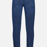 Back view of the CLOSED Unity Slim Jean in dark blue denim, featuring a slim fit, two rear pockets, belt loops, and a black patch on the waistband. The jeans are displayed against a plain white background.