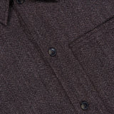 Close-up of the CLOSED Wool-blend Overshirt in dark brown, featuring a textured, finely woven Italian fabric. The overshirt has black buttons and a pointed collar, with a glimpse of the white label visible inside.