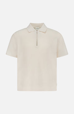 The CLOSED Zipped Neck Polo Shirt is a cream, short-sleeve polo crafted from textured cotton, featuring a collar and silver zip detail, shown on a plain white background.