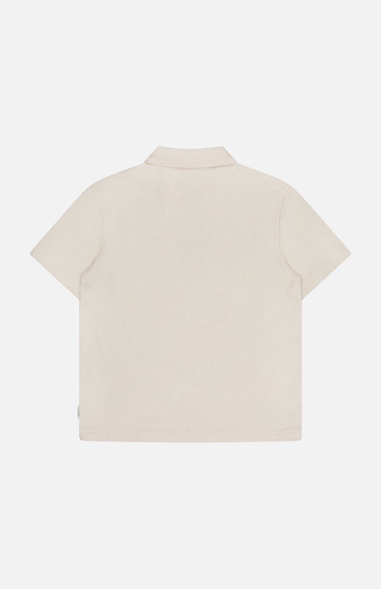 Back view of the CLOSED Zipped Neck Polo Shirt, a short-sleeve cream top with a collar and zippered neckline, shown against a plain white background.