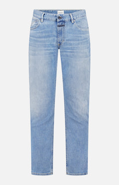 CLOSED Unity Slim Comfort Denim in light blue, shown flat on a white background. Features a five-pocket design, belt loops, button and zip closure, and a slim-fit cut.