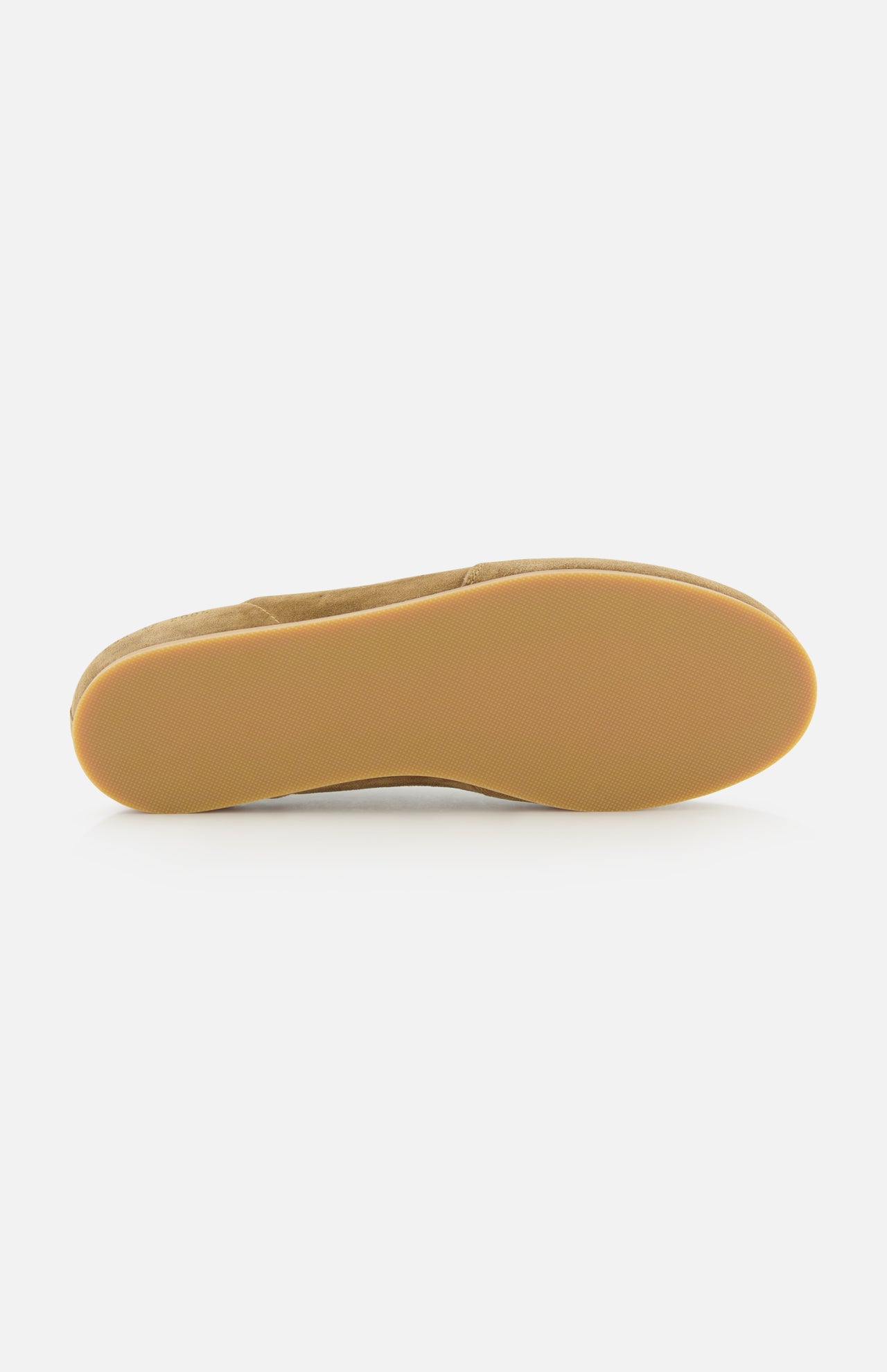 The COMMON PROJECTS Winter Suede Driving Sneaker is pictured from the bottom, highlighting its light tan rubber sole with a subtle textured pattern, set against a plain white background.