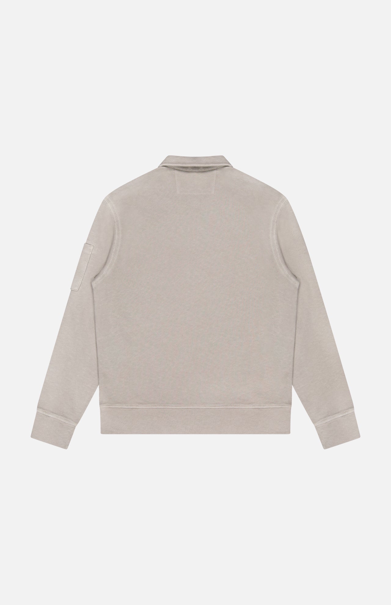 The C.P. COMPANY Malfile Fleece Polo Collar Sweatshirt is shown from the back in beige, featuring ribbed cuffs and hem plus a patch pocket on the left sleeve. Inspired by designer sportswear, it’s ideal for layering over a polo shirt against a plain white background.