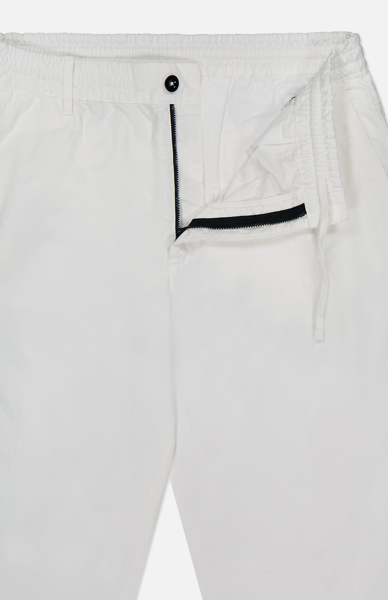 The C.P. COMPANY Micro-Reps Boxy Loose Pants in white feature a drawstring waistband, button closure, and open black zipper fly, crafted from high-density cotton and shown laid flat.