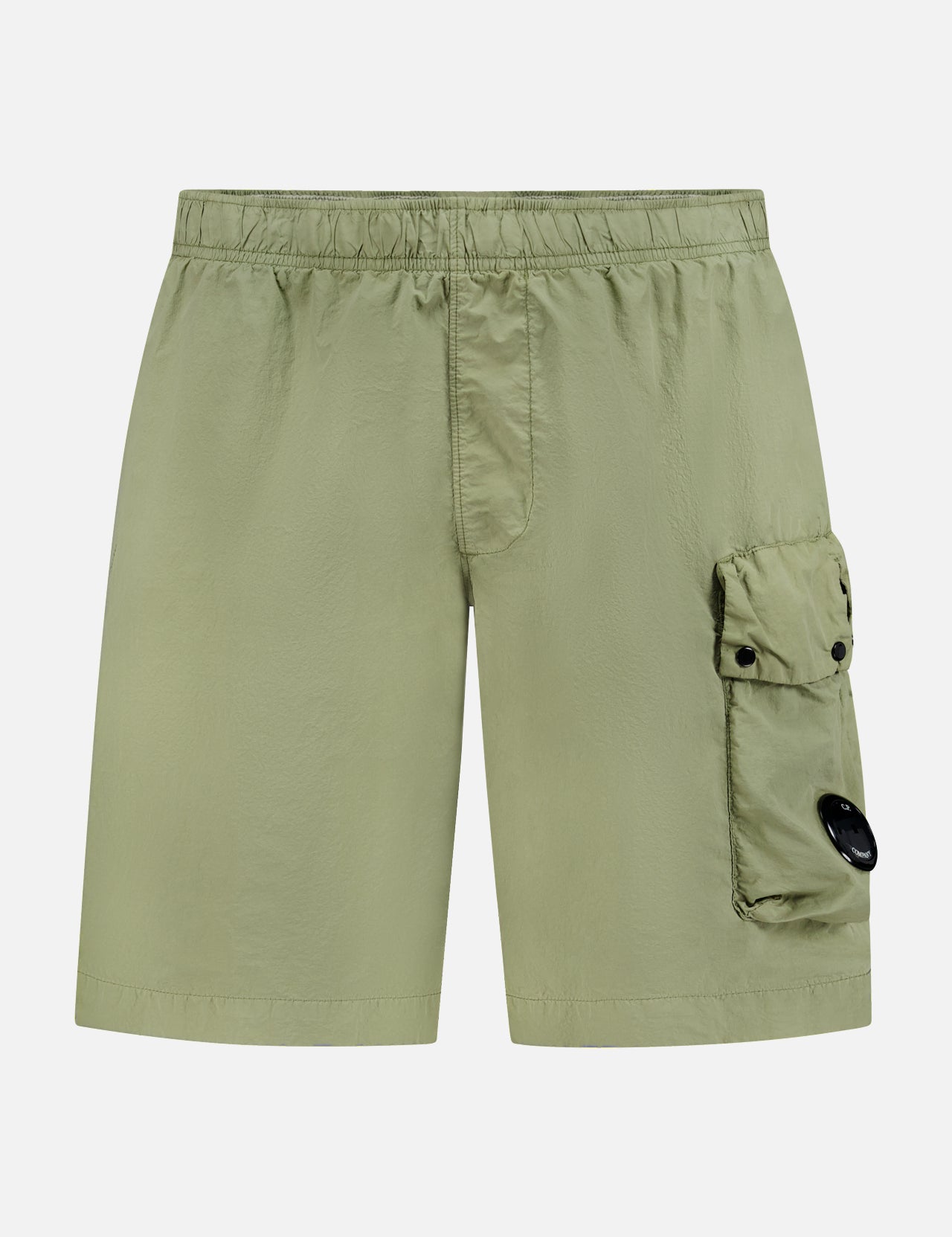 Light green Nylon Beachwear Boxer Short by C.P. COMPANY, with an elastic waistband, front fly detail, large right thigh flap pocket with two black buttons, and signature circular black lens.