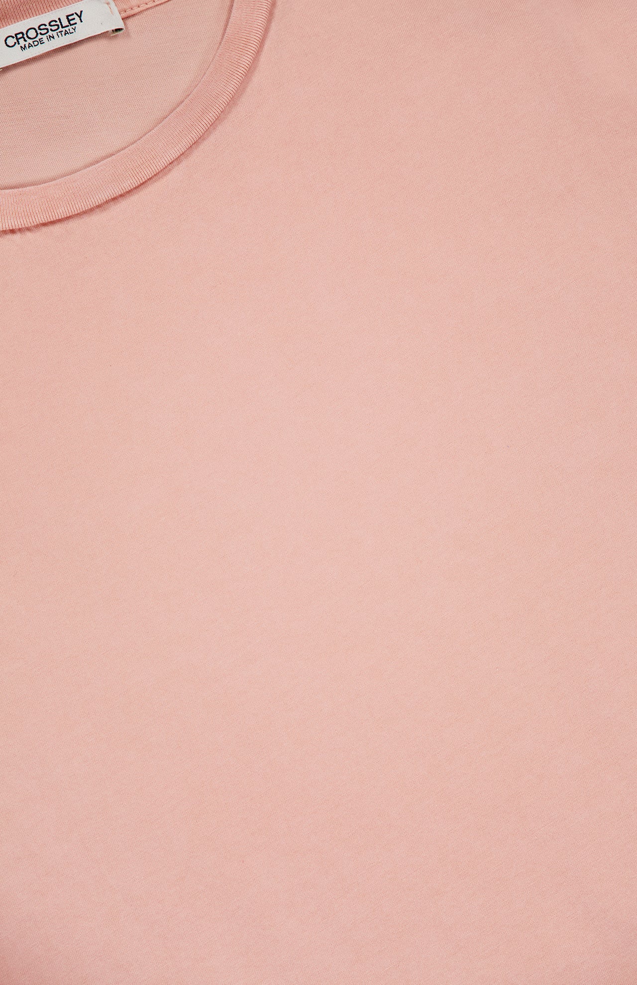 A close-up of the CROSSLEY Hunt Stone Wash Cotton Short Sleeve Crew T-shirt, light pink, Italian-made with a cotton crew neck and a visible CROSSLEY label in the top left corner.