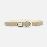 Light grey embossed Hollyhock Matte Lizard Belt by Déhanche with a silver buckle and multiple metal loops.