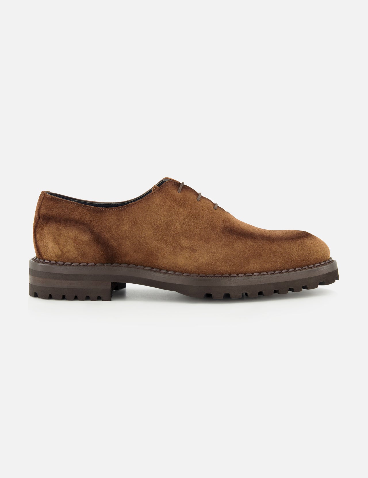 DI BIANCO’s Marche Suede Loafer in light brown features hand-stitched detailing, visible stitching, a lace-up design, and a thick dark rubber sole, shown in profile on a plain white background.