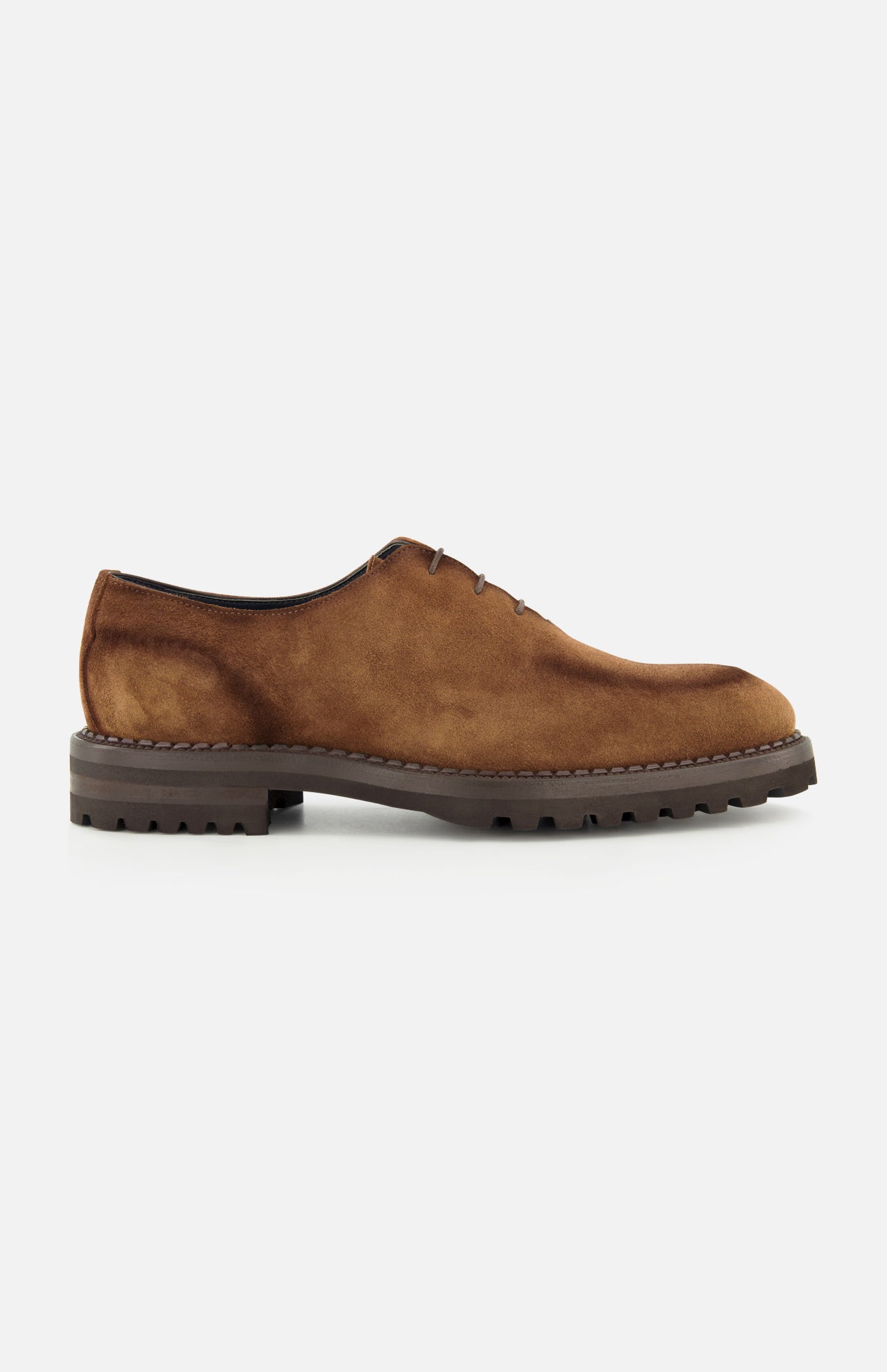 DI BIANCO’s Marche Suede Loafer in light brown features hand-stitched detailing, visible stitching, a lace-up design, and a thick dark rubber sole, shown in profile on a plain white background.