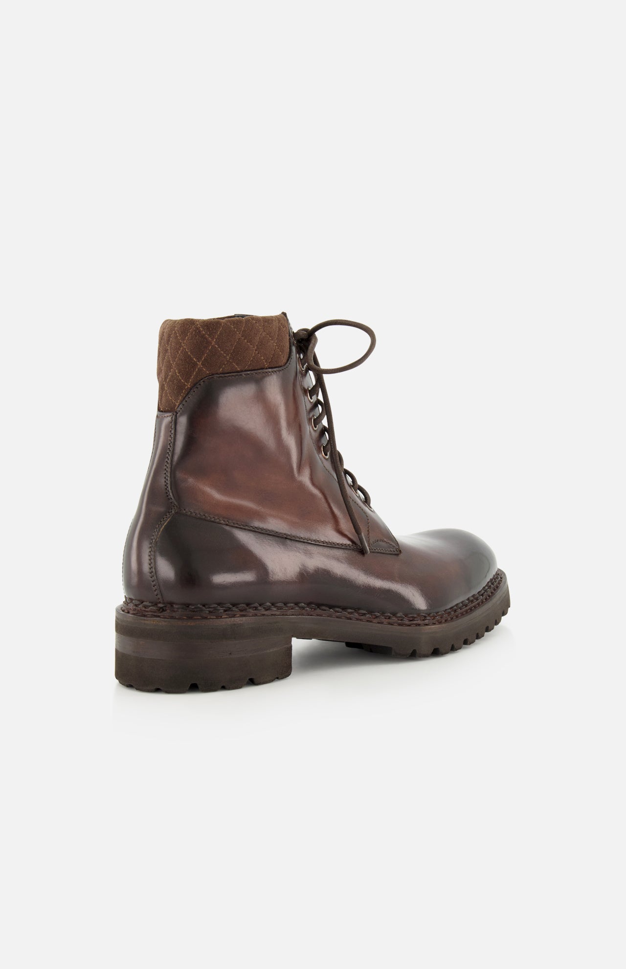 Introducing the DI BIANCO Torino Calfskin Suede Boot: a luxurious handmade Italian boot in dark brown suede, featuring a sturdy thick sole and a quilted fabric collar at the ankle. Displayed from a rear side angle against a white background.