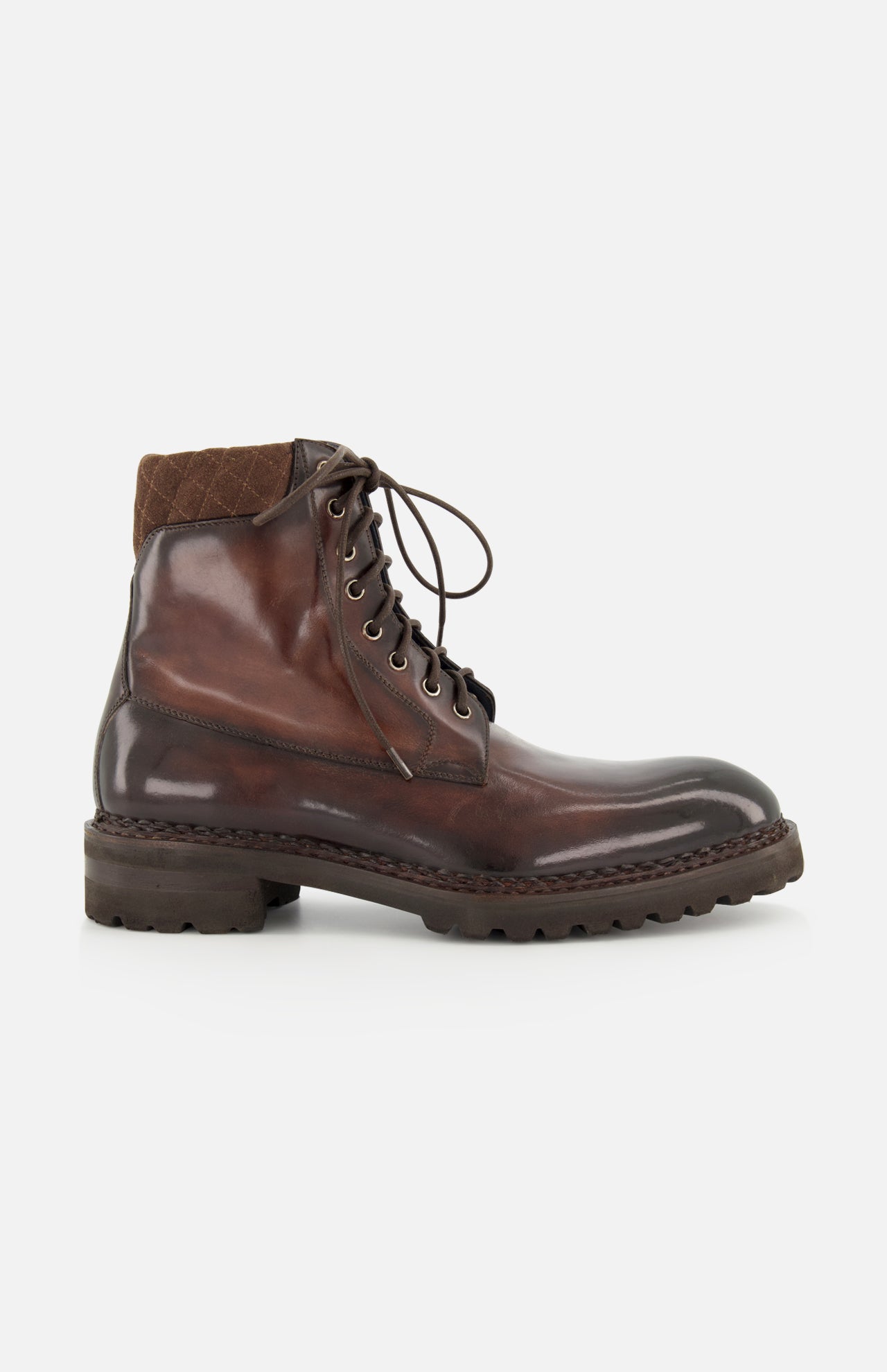The DI BIANCO Torino Calfskin Suede Boot is shown in profile on a plain white background—a single, dark brown military-style boot, handmade in Italy, featuring a thick rubber sole, quilted fabric around the ankle, and detailed stitching.