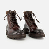 A pair of DI BIANCO Torino Calfskin Suede Boots, handmade in Italy, featuring thick rubber soles and displayed on a white background.