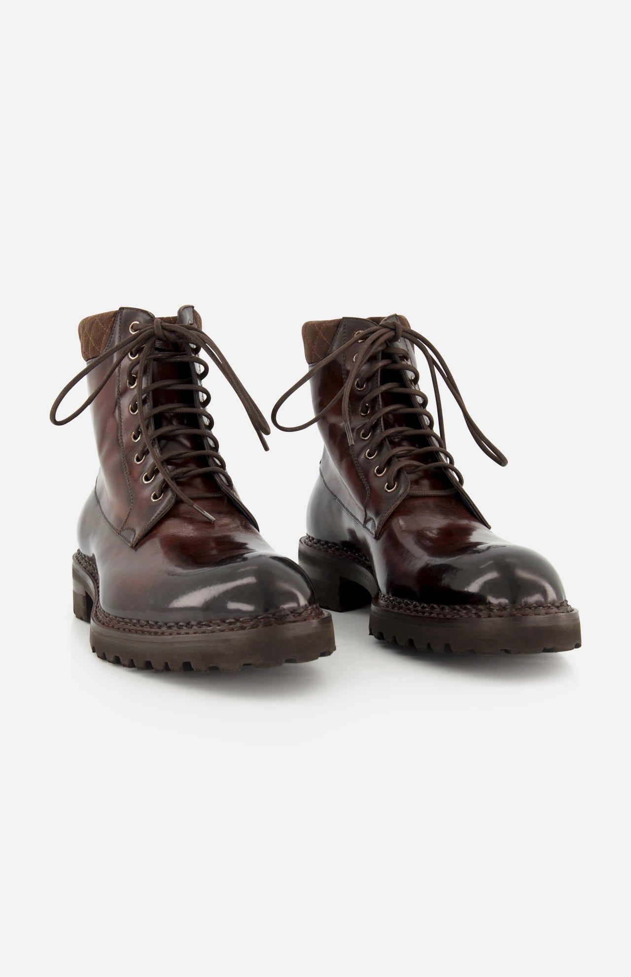 A pair of DI BIANCO Torino Calfskin Suede Boots, handmade in Italy, featuring thick rubber soles and displayed on a white background.