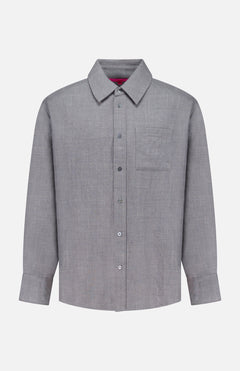 The ELDER STATESMAN Pashmina Big Button Up Shirt is a long-sleeve, light grey shirt featuring a front chest pocket and designed for versatile office wear, shown on a plain white background.