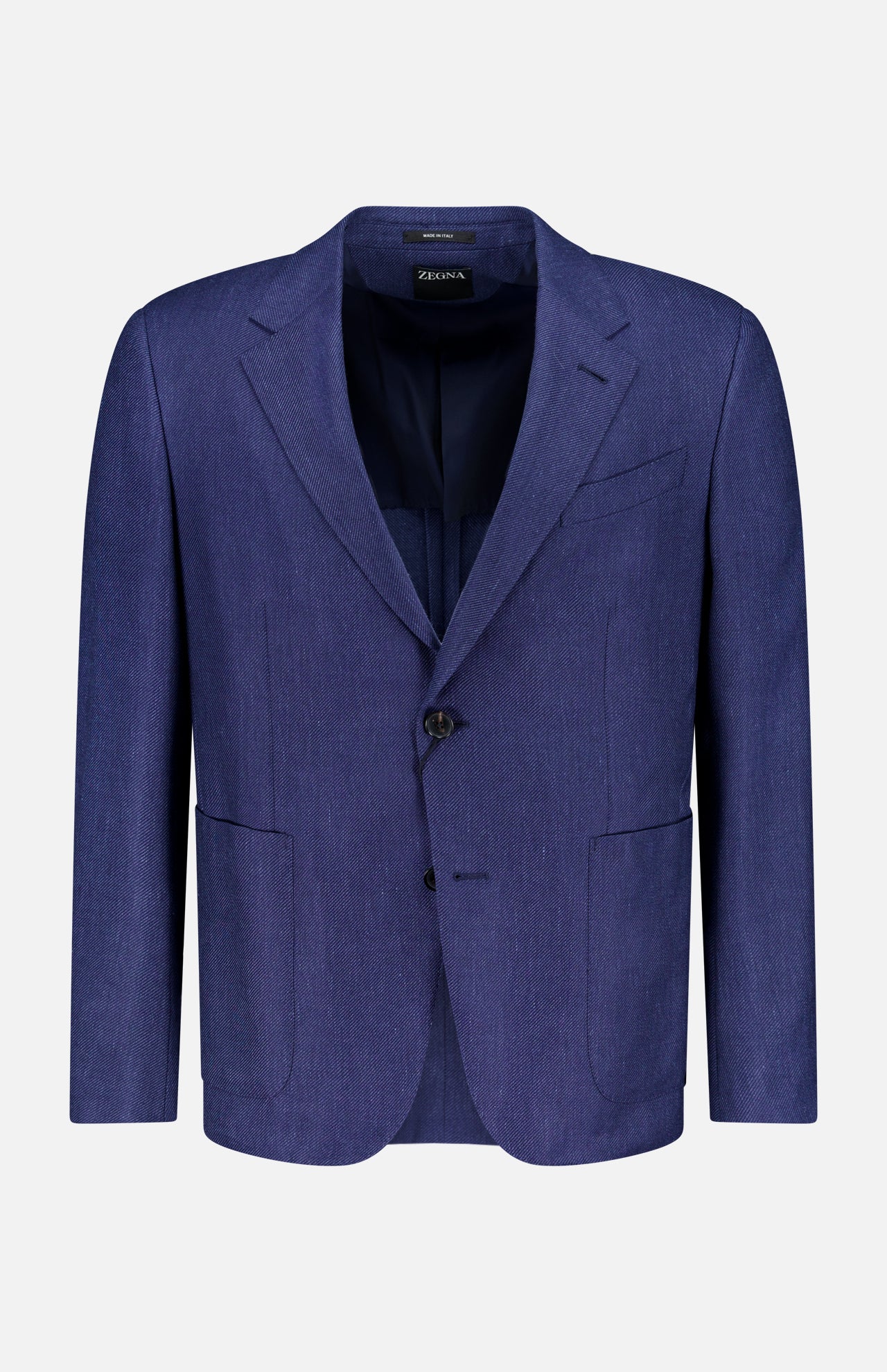 The ZEGNA Cashmere Silk Linen Sportcoat is a dark blue, single-breasted two-button jacket with notched lapels, front patch pockets, and a chest pocket. Made in Italy from a luxurious blend, it’s shown against a plain white background.