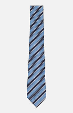 The ZEGNA Cinque Pieghe Jacquard Tie is a luxury Italian silk tie in blue, featuring diagonal navy and light gray stripes on a white background.