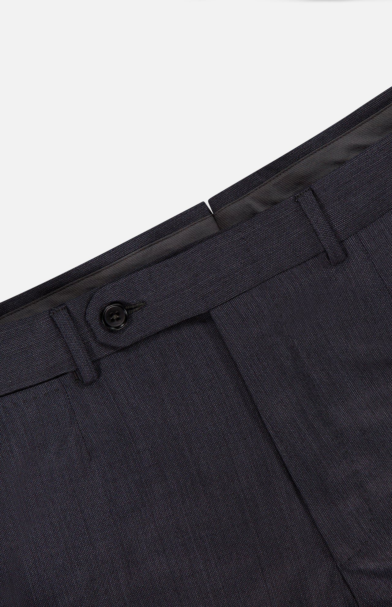 Close-up of the waist and upper section of ZEGNA's 15MilMil15 Wool Suit pants in dark gray, made in Italy, with button closure, belt loops, and a subtle diagonal fabric texture.
