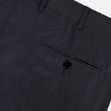 Close-up of the back of ZEGNA's 15MilMil15 Wool Suit pants in dark grey, made in Italy, featuring a single welt pocket with a black button and belt loops along the waistband.