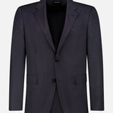 The ZEGNA 15MilMil15 Wool Suit blazer for men, in dark navy blue, features a notched lapel, two front buttons, and a chest pocket. Expertly crafted in Italy and shown on a plain white background.