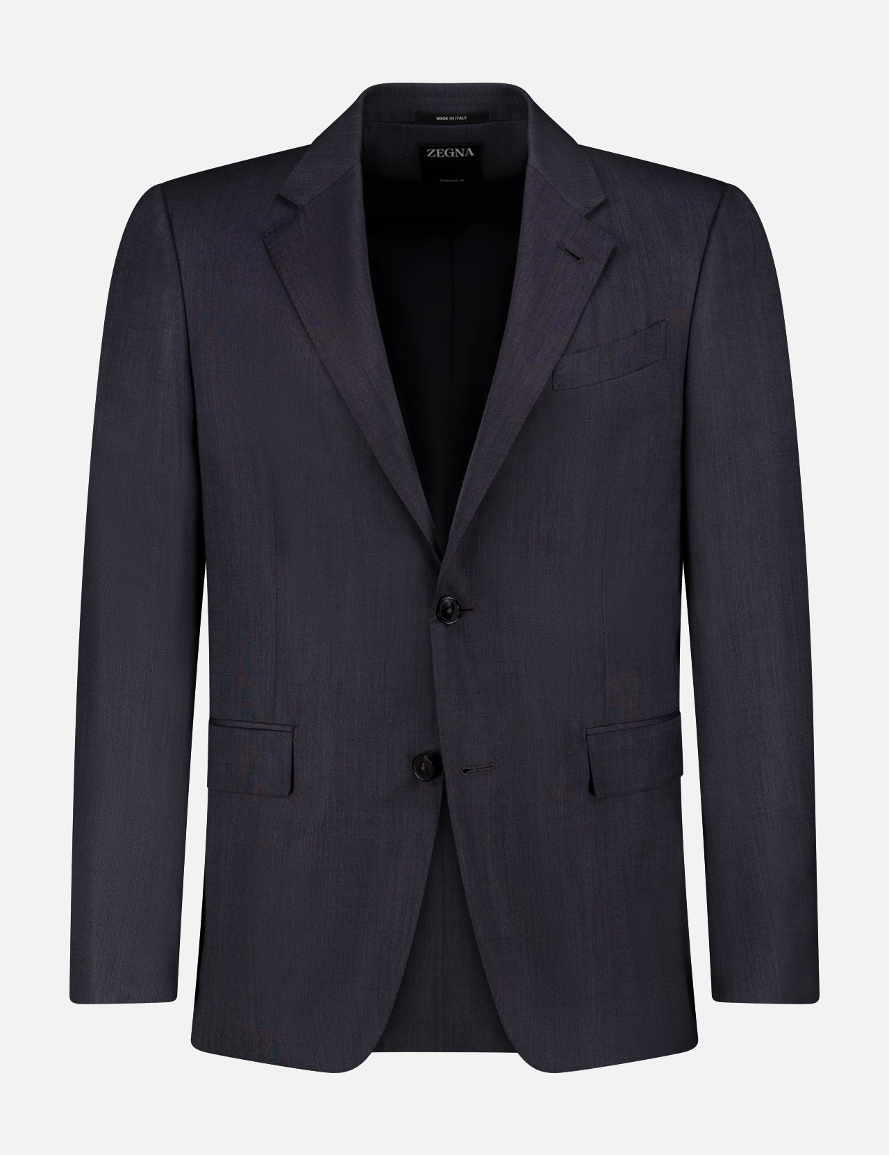 The ZEGNA 15MilMil15 Wool Suit blazer for men, in dark navy blue, features a notched lapel, two front buttons, and a chest pocket. Expertly crafted in Italy and shown on a plain white background.