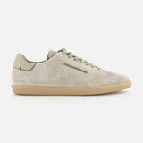 Presenting the ZEGNA 232 Low Top Sneaker: a beige suede shoe featuring a light brown rubber sole, olive green laces, and subtle stitching details—expertly crafted in Italy and captured in a side view against a white background.