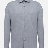 The ZEGNA Cashco Dress Shirt is a long-sleeve, light grey dress shirt crafted from premium cashmere cotton, featuring a classic collar and button-up design. Made in Italy, it is shown against a plain white background.