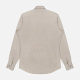 The ZEGNA Cashco Dress Shirt is displayed laid flat from the back, showcasing its beige color, buttoned cuffs, and curved hem against a plain white background. This luxury shirt features long sleeves and refined tailoring for an elegant look.