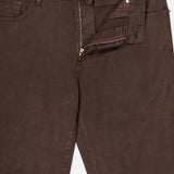 A pair of ZEGNA Comfort Linen Cotton Pants in dark brown, slim fit, shown from the waist down with top button fastened and zipper slightly open, highlighting front pockets and belt loops.