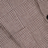 Close-up of the ZEGNA Houndstooth Plaid Linen-blend Sportcoat, showcasing a brown and beige glen check pattern with intersecting lines, small checks, and two visible dark buttons—ideal for a men's professional wardrobe.