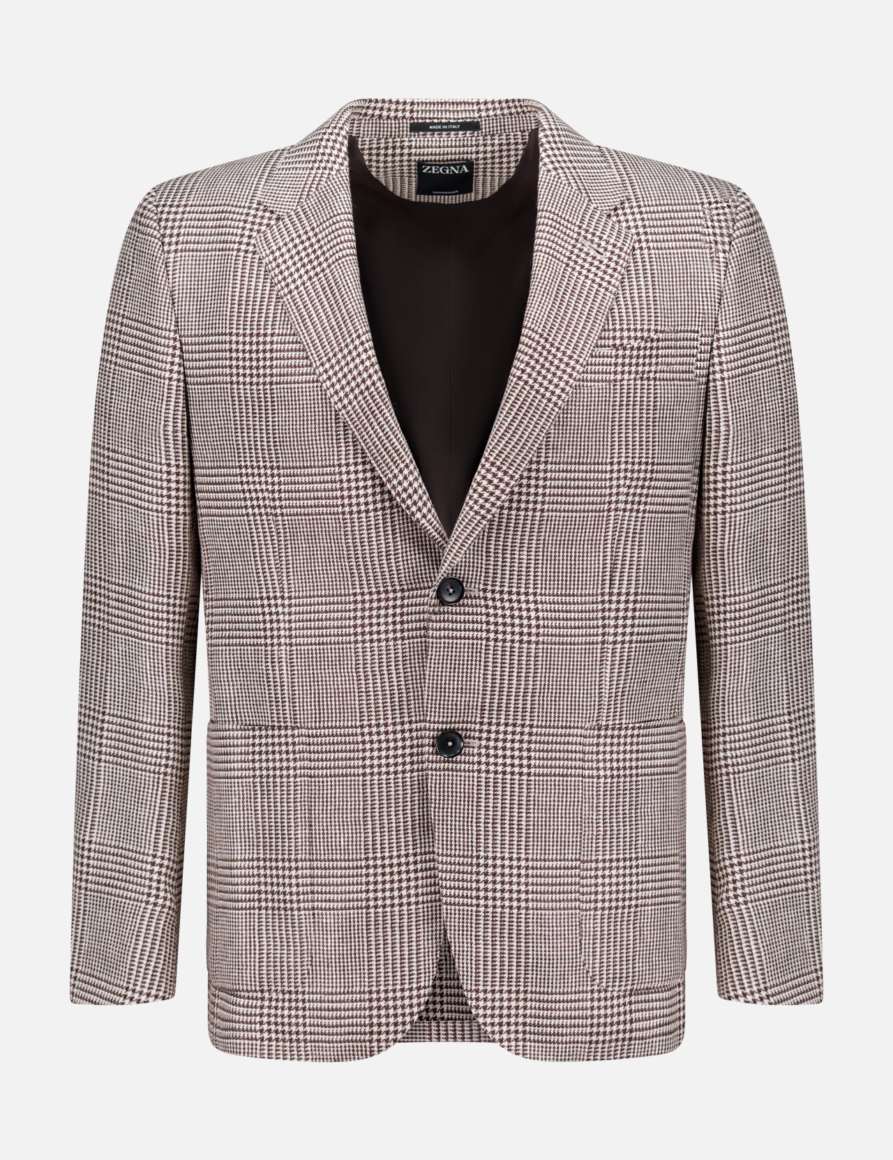 The ZEGNA Houndstooth Plaid Linen-blend Sportcoat features a black and white pattern, single-breasted design, notched lapels, two front buttons, and flap pockets—an ideal choice to elevate any men's professional wardrobe. Displayed on a plain white background.