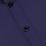 Close-up of a navy blue Microfiber Polyester Twill Vest by ZEGNA with black buttons and a leather collar. Part of the garment label displaying “ZEGNA” is visible at the top left.
