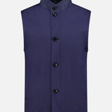 The ZEGNA Microfiber Polyester Twill Vest features a high leather collar, water-repellent navy fabric, four black front buttons, and two slanted side pockets, shown against a plain white background.