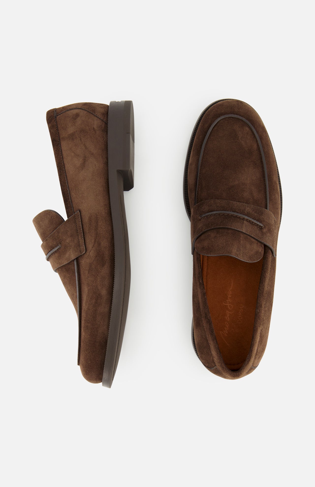 Top and side view of ZEGNA’s Mocassin Loafer with Band in brown Italian suede, featuring visible stitching and a low heel, displayed on a white background; these men’s loafers exemplify classic elegance and quality craftsmanship, Made in Italy.