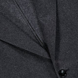 Close-up of the ZEGNA Oasi Cashmere Beaver Jacket in dark gray, featuring a visible lapel, pronounced seam detailing, and a single black button. The luxuriously soft and subtly textured fabric exemplifies the refined elegance of Italian craftsmanship.