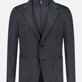 The ZEGNA Oasi Cashmere Beaver Jacket is a dark gray luxury menswear blazer featuring notched lapels, front flap pockets, and a double-button closure, layered over a coordinating zipped mock-neck piece. Expertly crafted in Italy from refined cashmere, it is showcased against a plain white background.