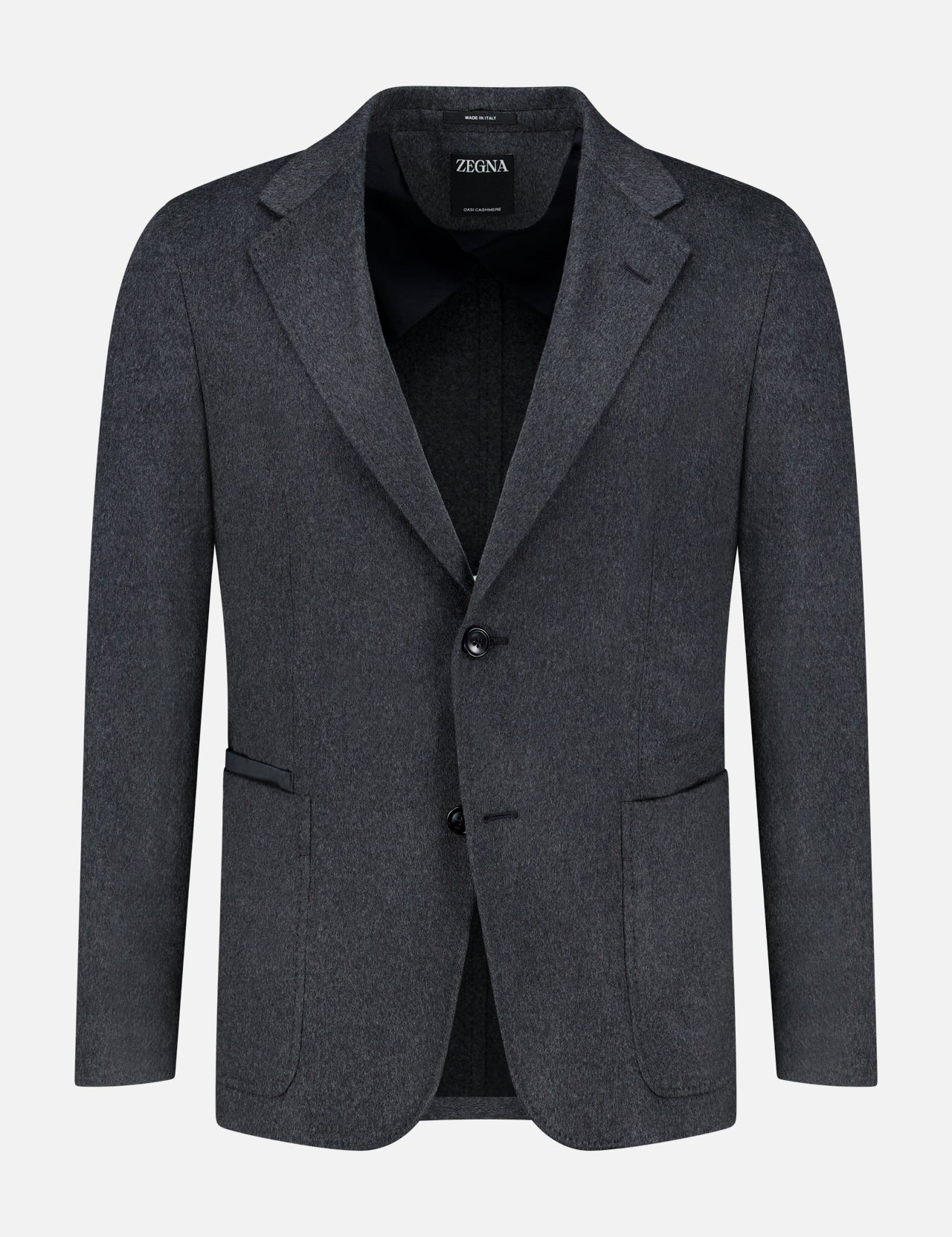 The Oasi Cashmere Beaver Jacket by ZEGNA is a charcoal gray men’s blazer, masterfully crafted in Italy. It showcases two buttons, notched lapels, and front patch pockets—an elegant addition to luxury menswear, displayed on a plain white background.