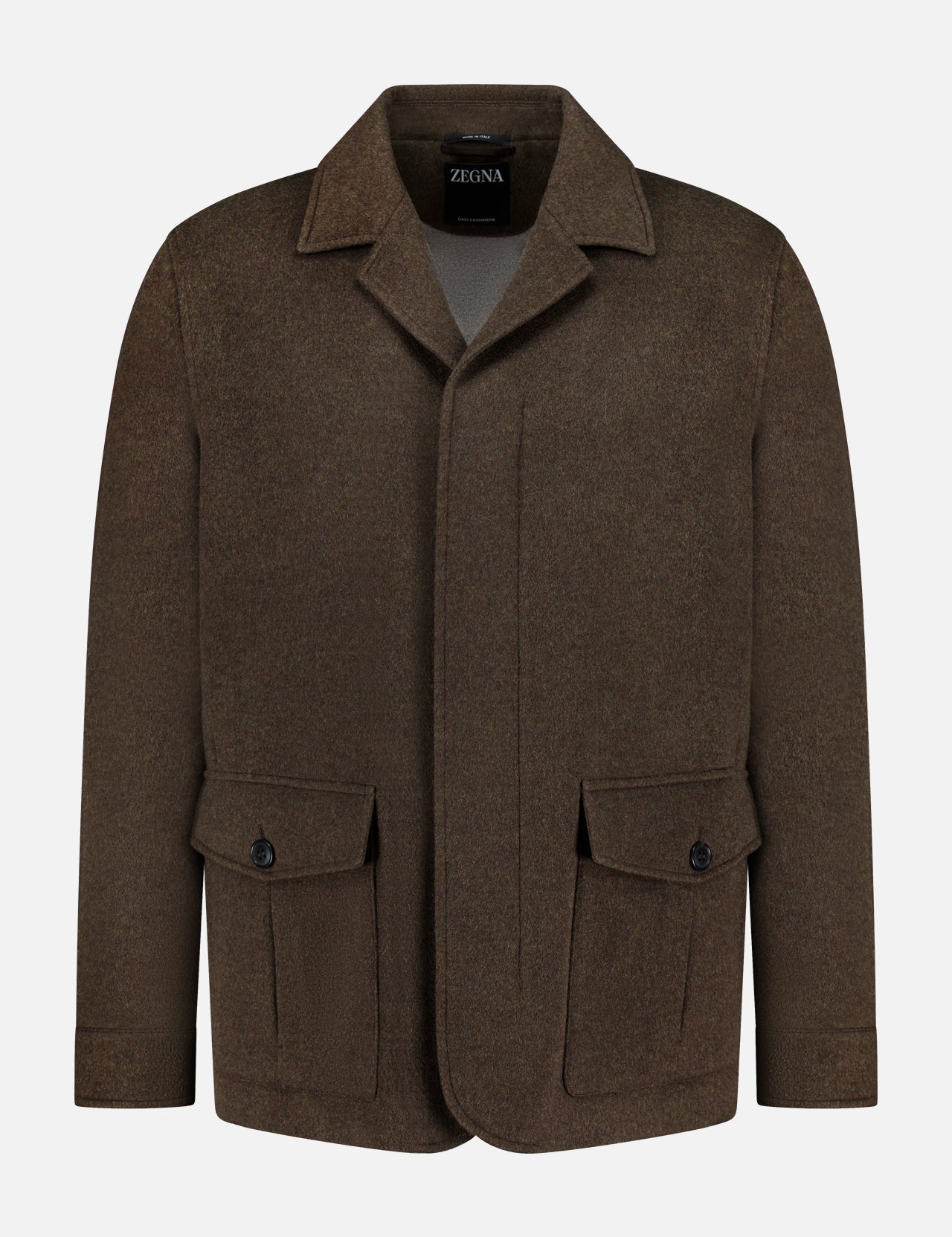 Oasi Cashmere Jacket by ZEGNA: brown wool blend with collar, button-down front, two buttoned flap pockets, long sleeves, and subtle leather accents. Displayed on a plain white background.