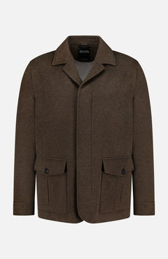 Oasi Cashmere Jacket by ZEGNA: brown wool blend with collar, button-down front, two buttoned flap pockets, long sleeves, and subtle leather accents. Displayed on a plain white background.