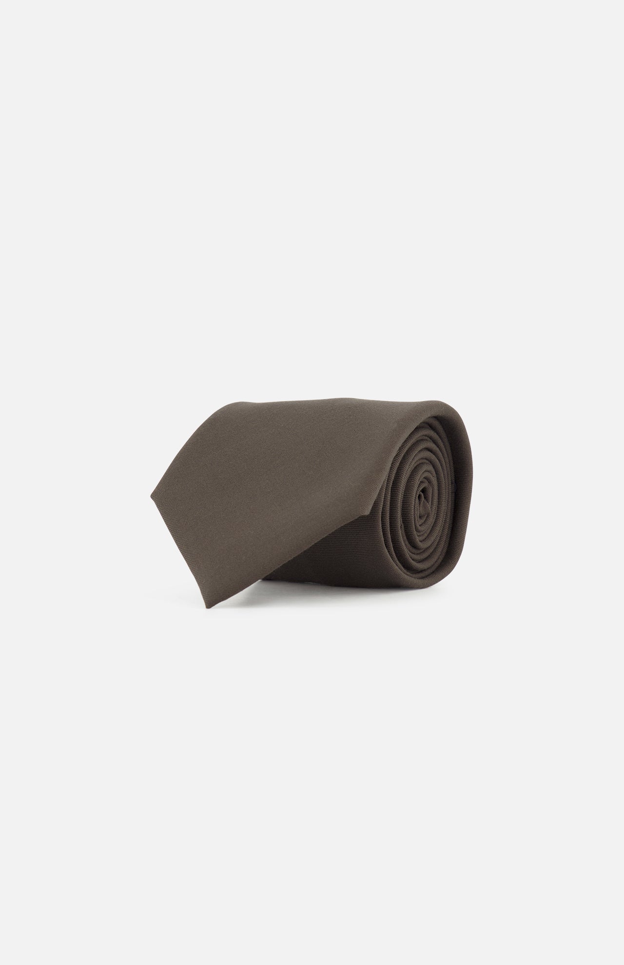 The ZEGNA Oasi Cashmere Jacquard Tie, crafted in Italy from luxurious cashmere, is elegantly rolled and displayed against a clean white background.