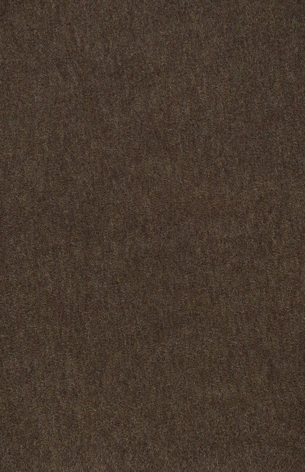 A close-up view of a brown textured surface, showcasing the luxurious Oasi Cashmere Scarf by ZEGNA, with a slightly mottled appearance and consistent coloration throughout the fabric.